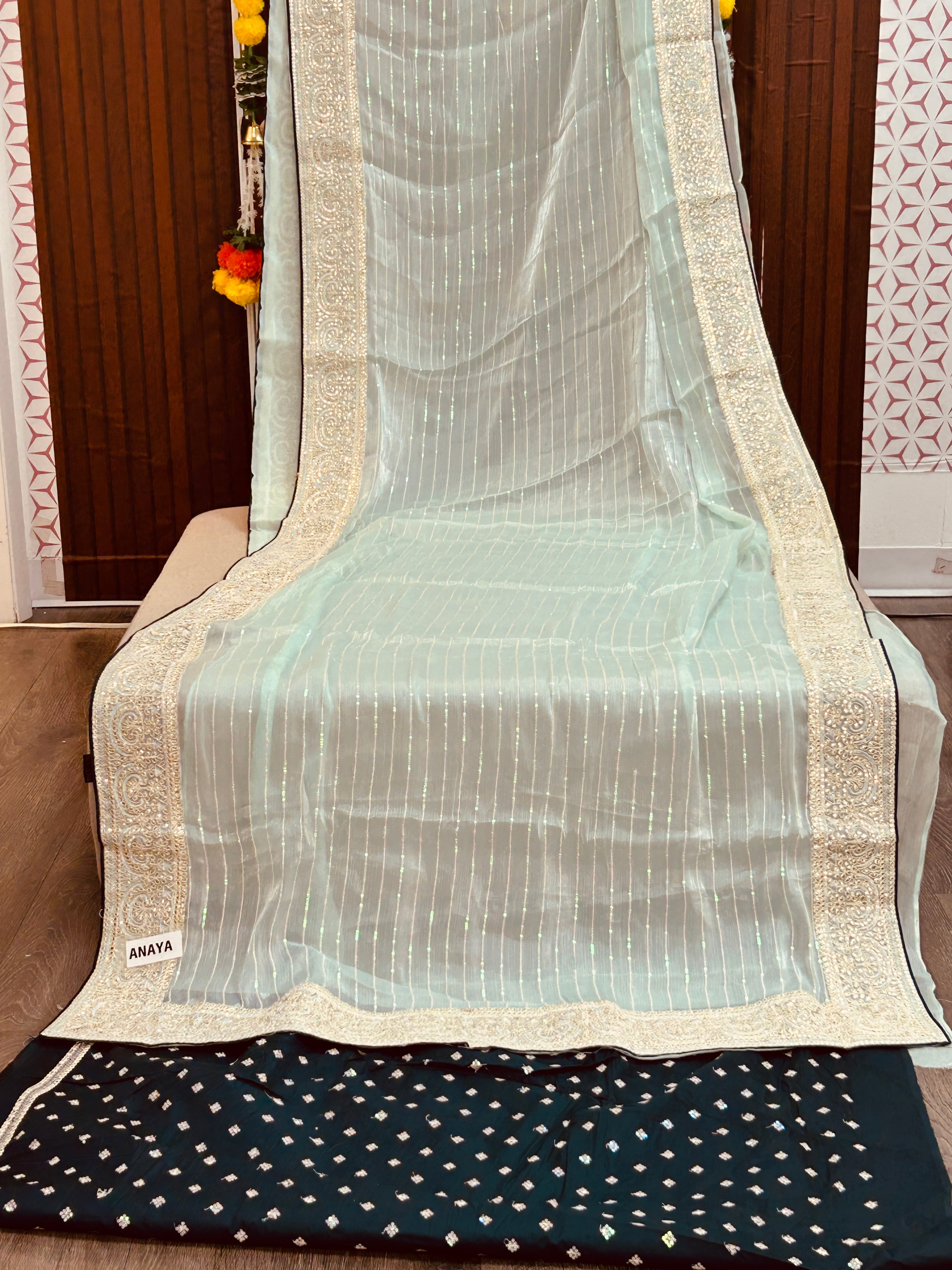 Tissue silk saree with contrast blouse piece