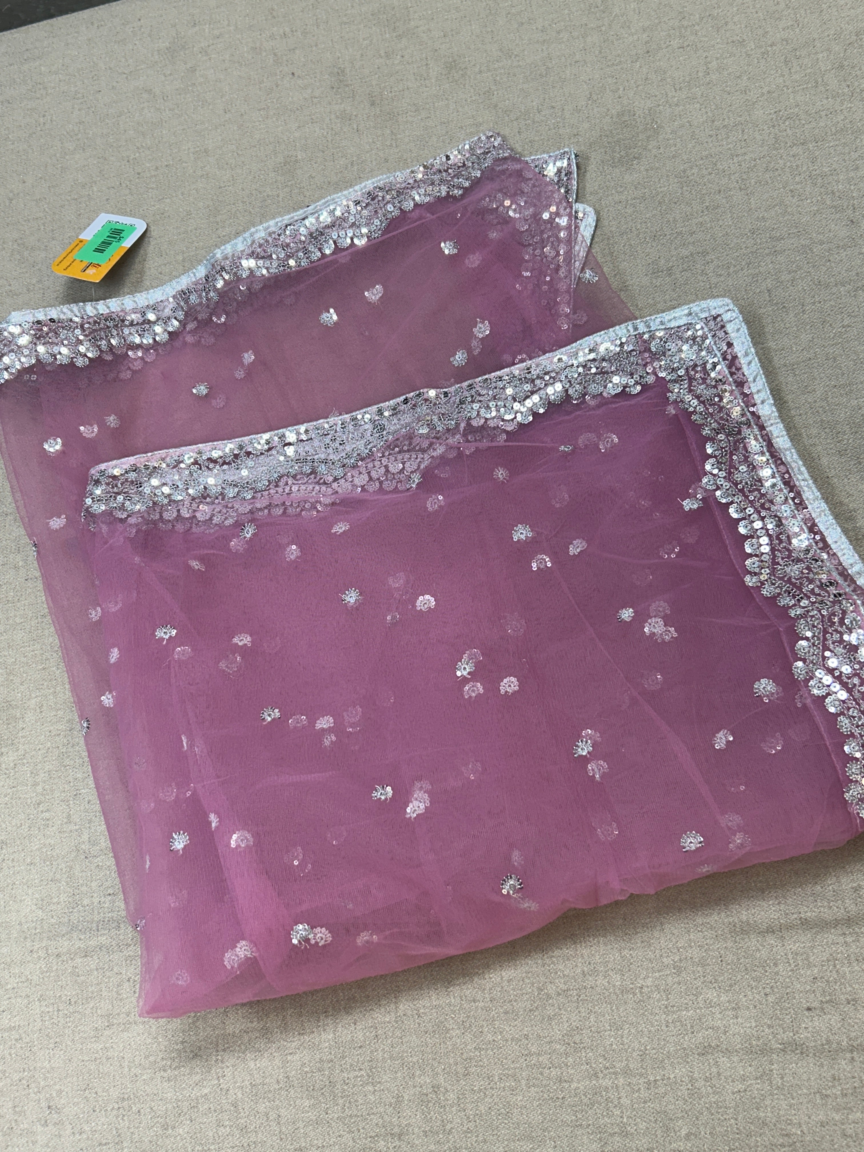 Light pink net dupatta with silver sequin border