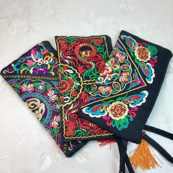 The Artisan's Bloom - Hand-Embroidered Cotton Hand Purse