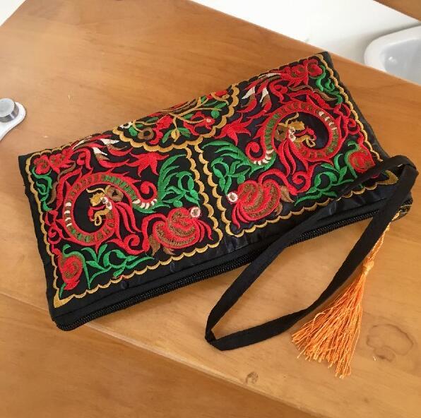 The Artisan's Bloom - Hand-Embroidered Cotton Hand Purse