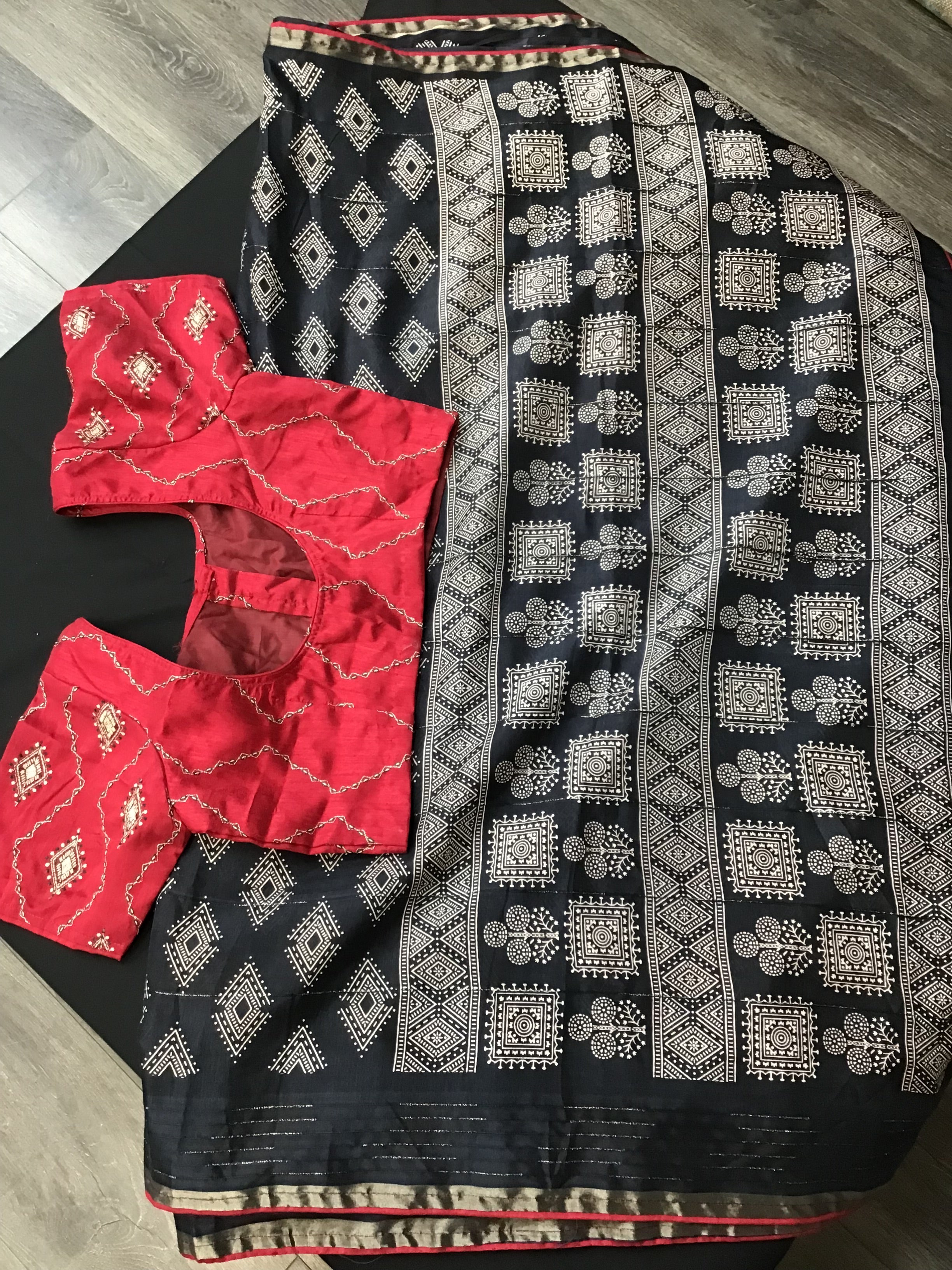 Black saree with red blouse