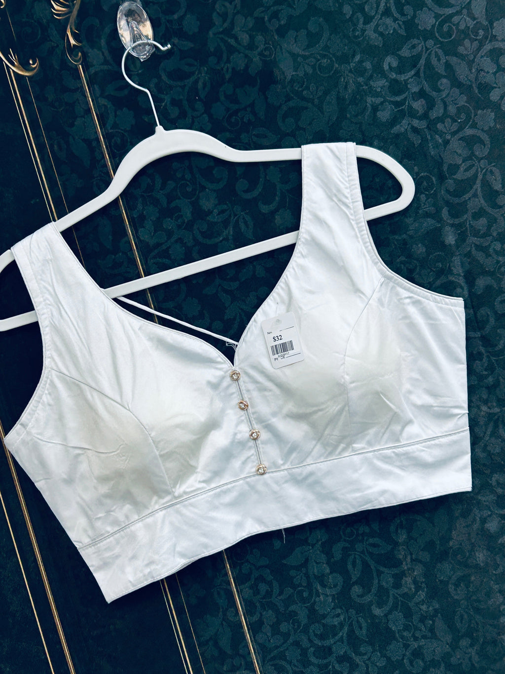 White sleeveless blouse