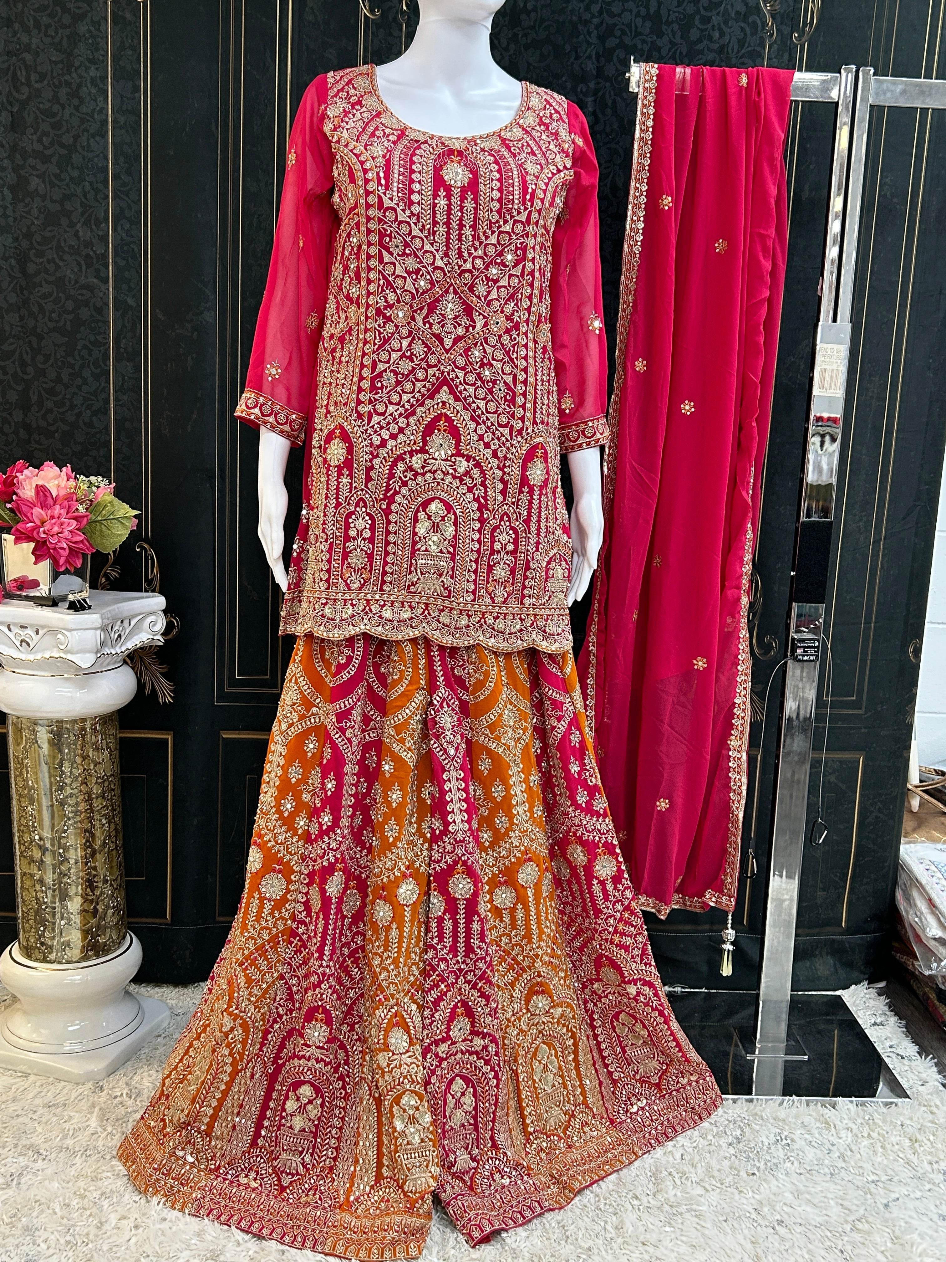 Dark pink sharara suit with heavy work