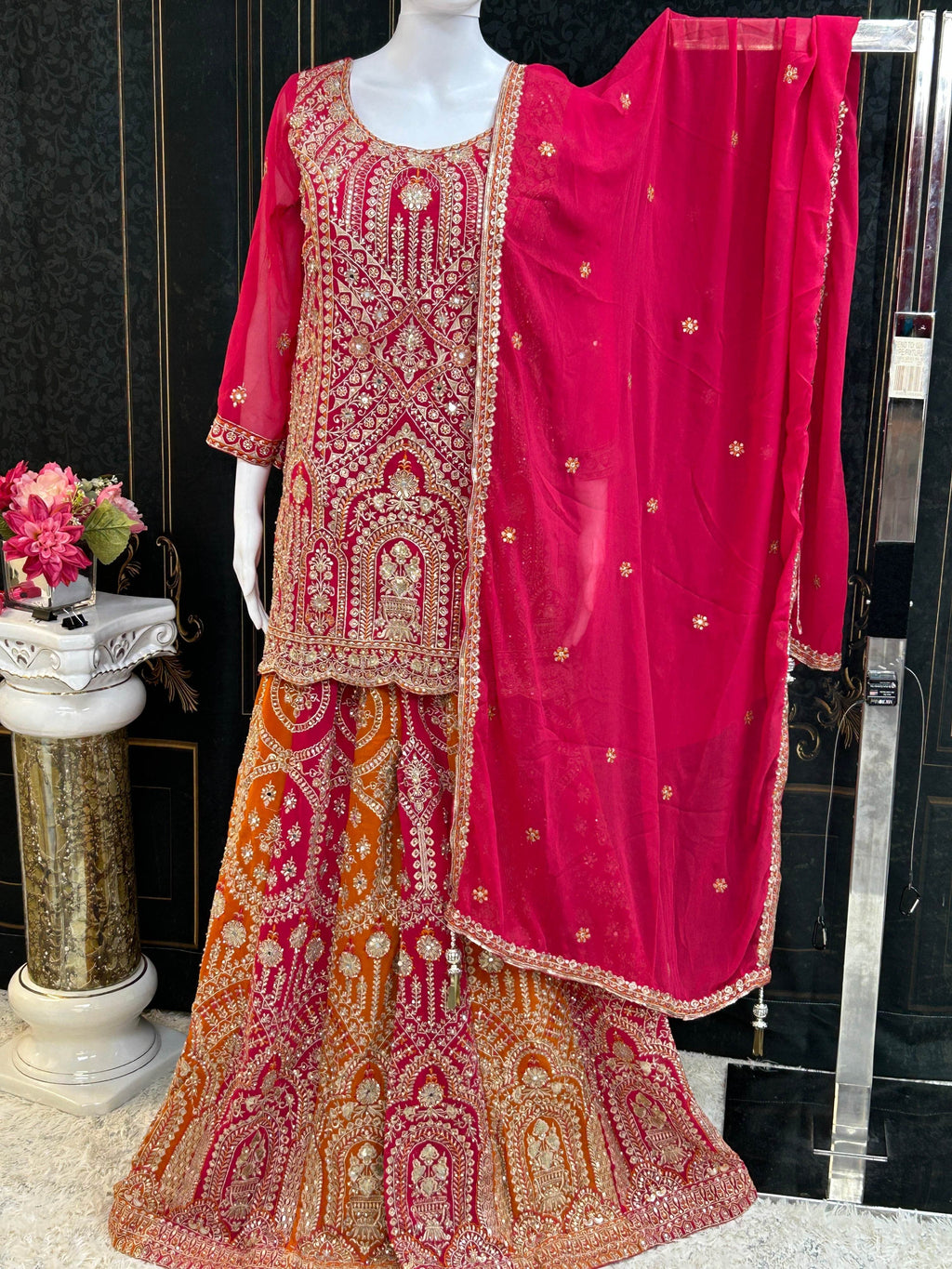 Dark pink sharara suit with heavy work
