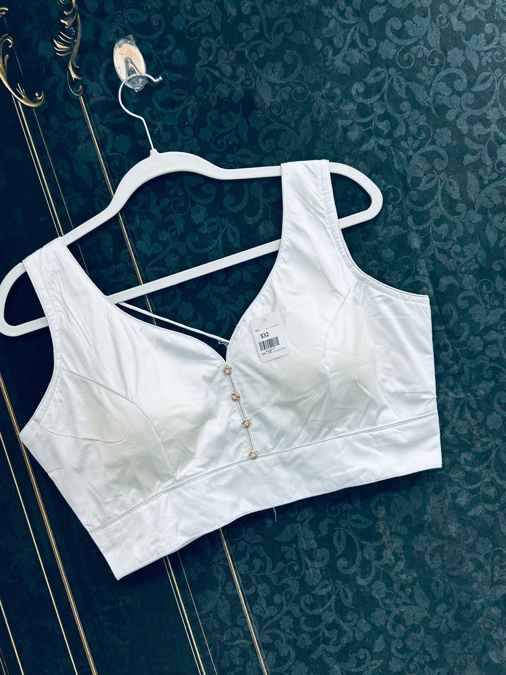 White sleeveless blouse