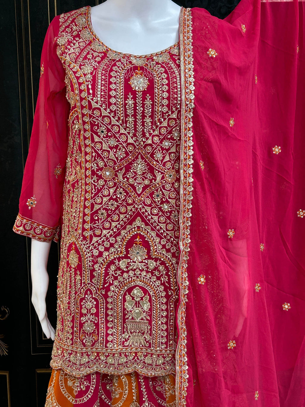 Dark pink sharara suit with heavy work