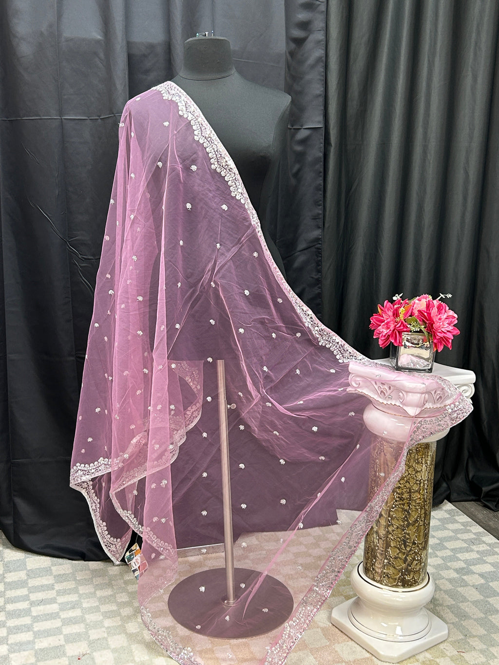 Light pink net dupatta with silver sequin border