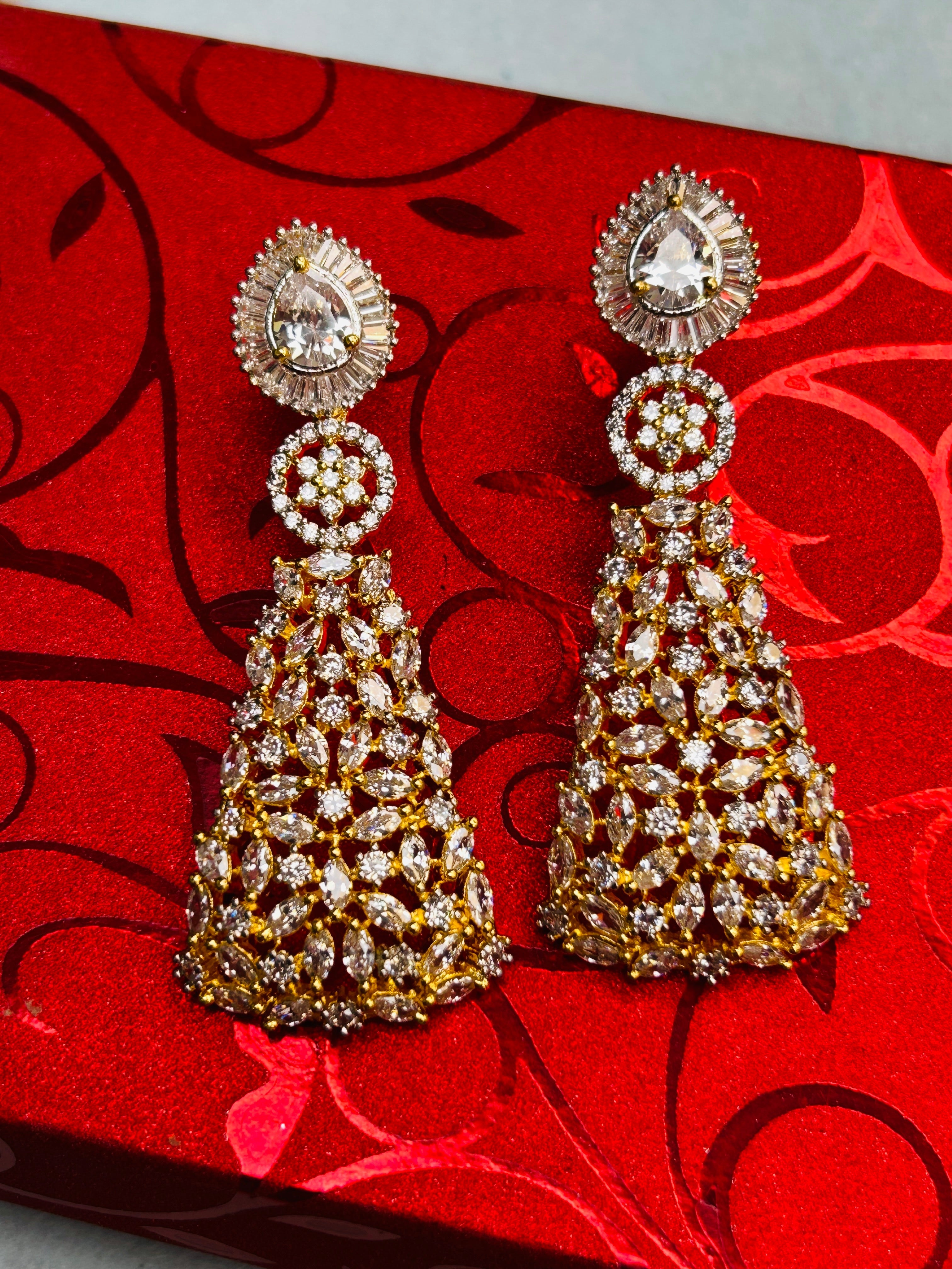 AD earrings: gold polish