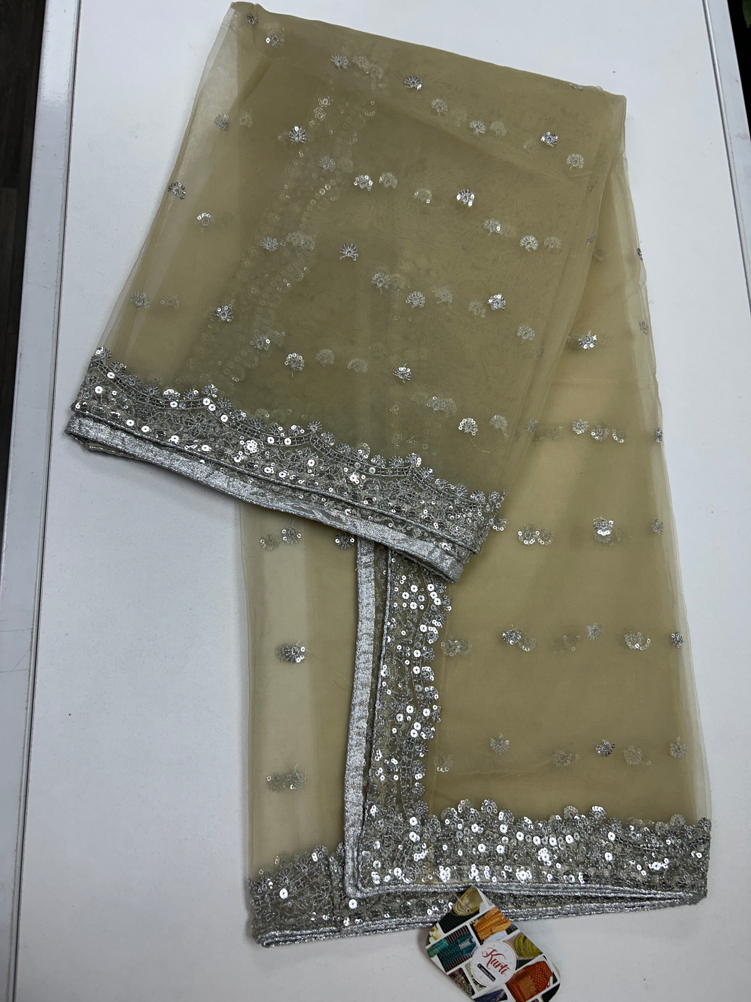 Beige color net duppata with silver sequence work
