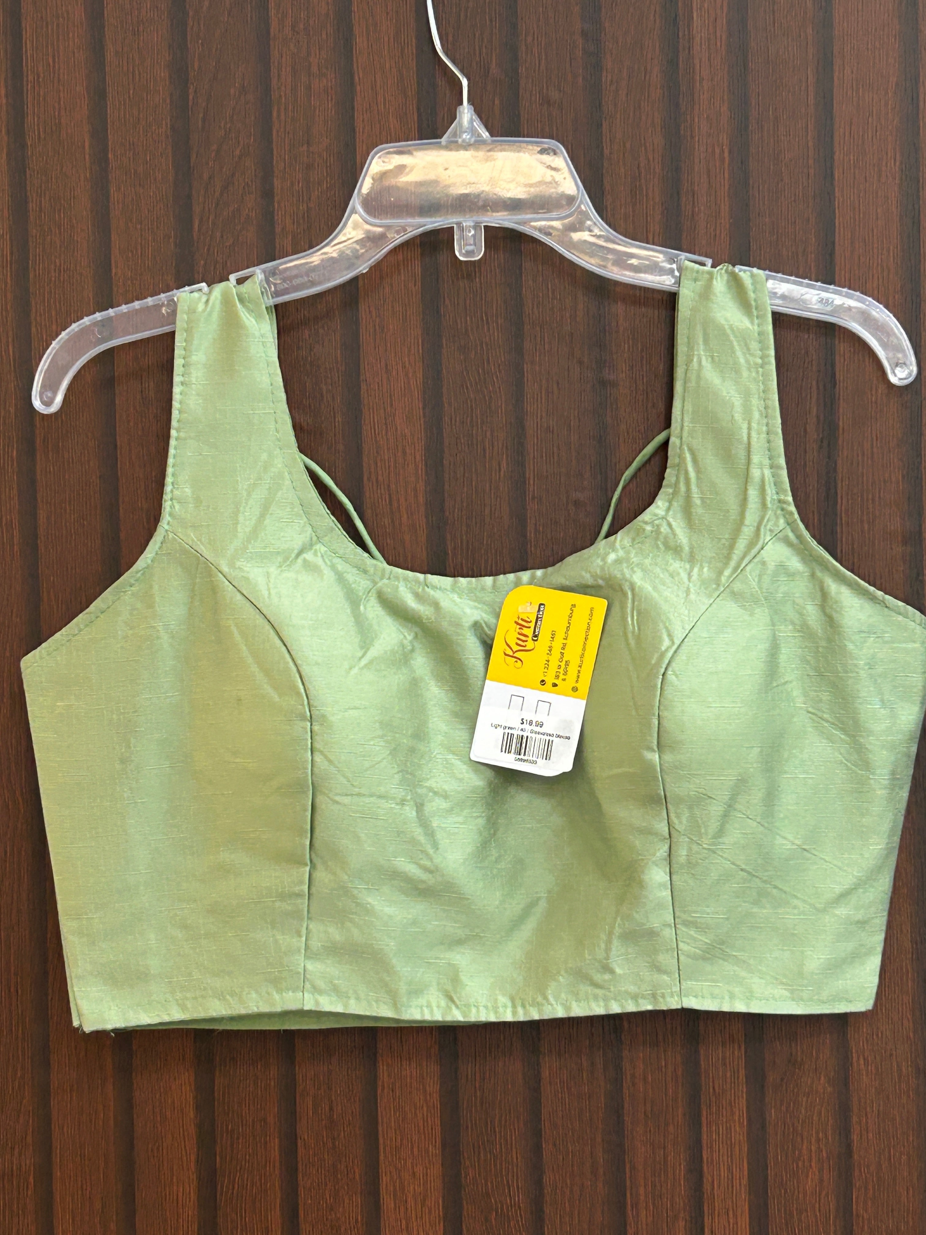 Light green silk blouse