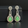 Green carved stone earrings