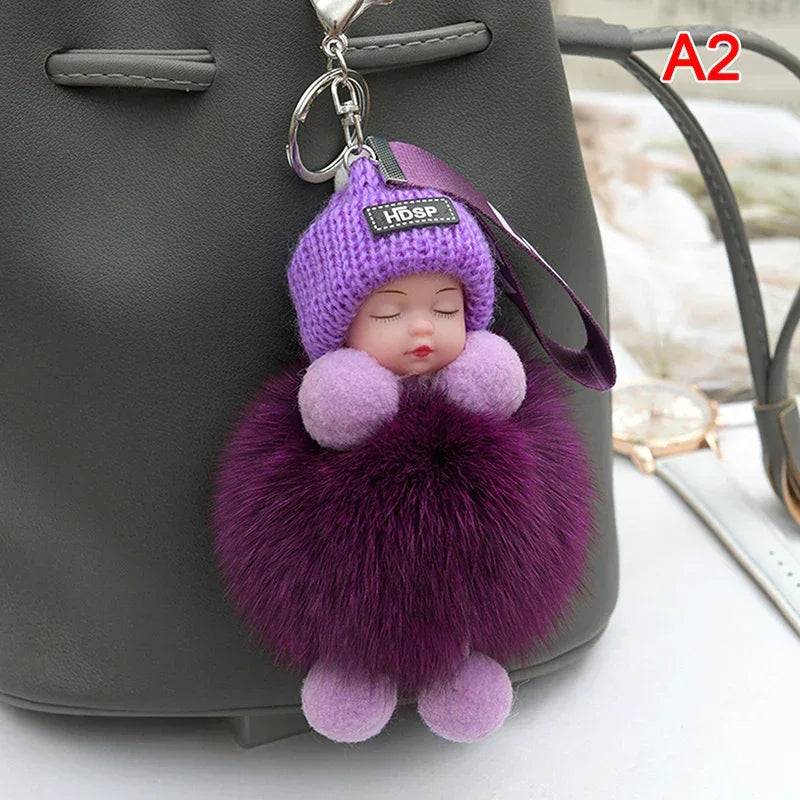 Pompom Sleeping Baby Keychain