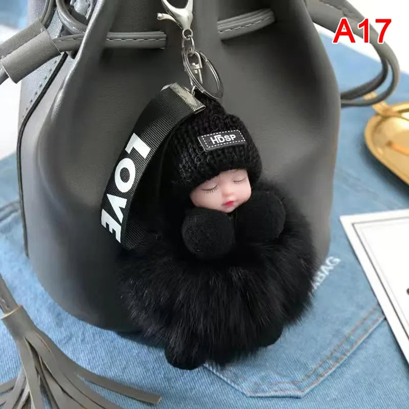 Pompom Sleeping Baby Keychain