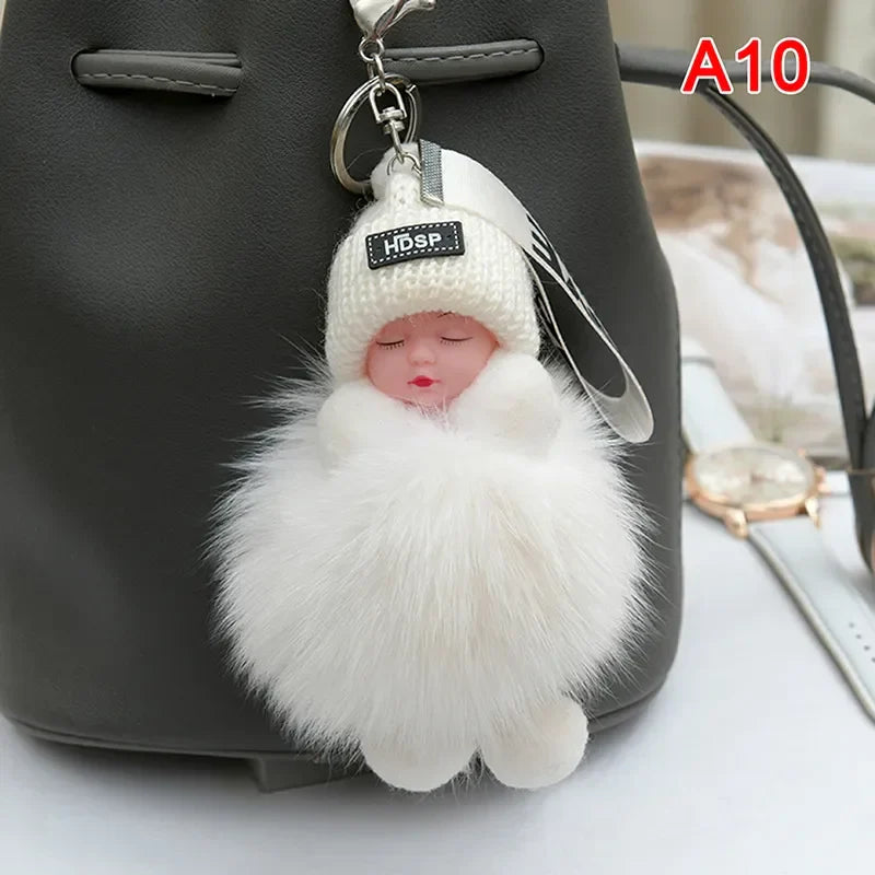 Pompom Sleeping Baby Keychain