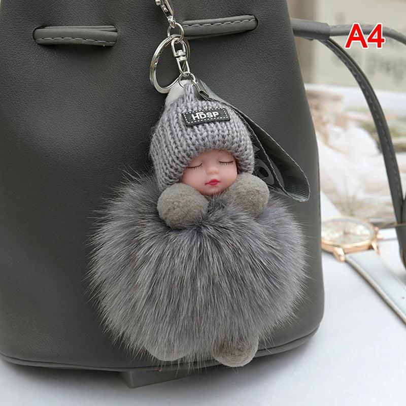 Pompom Sleeping Baby Keychain