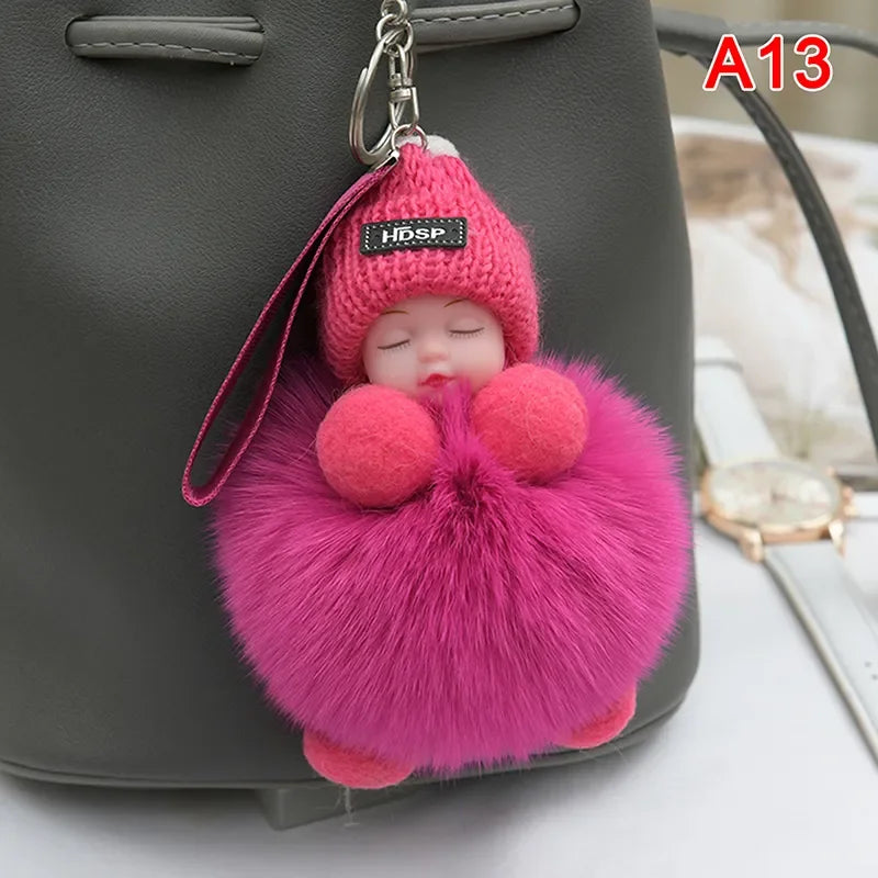 Pompom Sleeping Baby Keychain