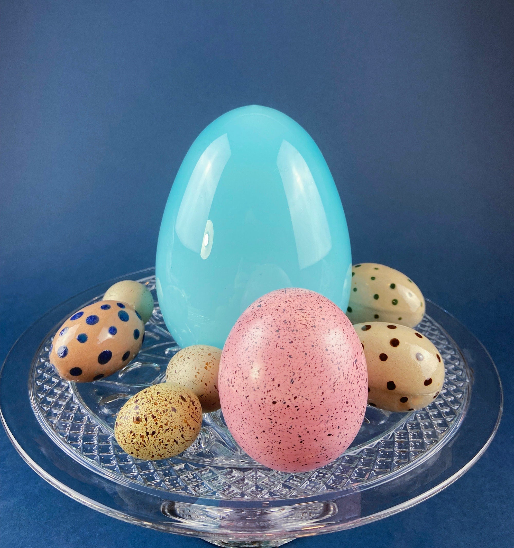 Set of Two Glass Eggs. Large Textured Blue and Smaller Purple with Swirl Embedded in Glass. Easter or Spring Decor. Dining Room Decor.