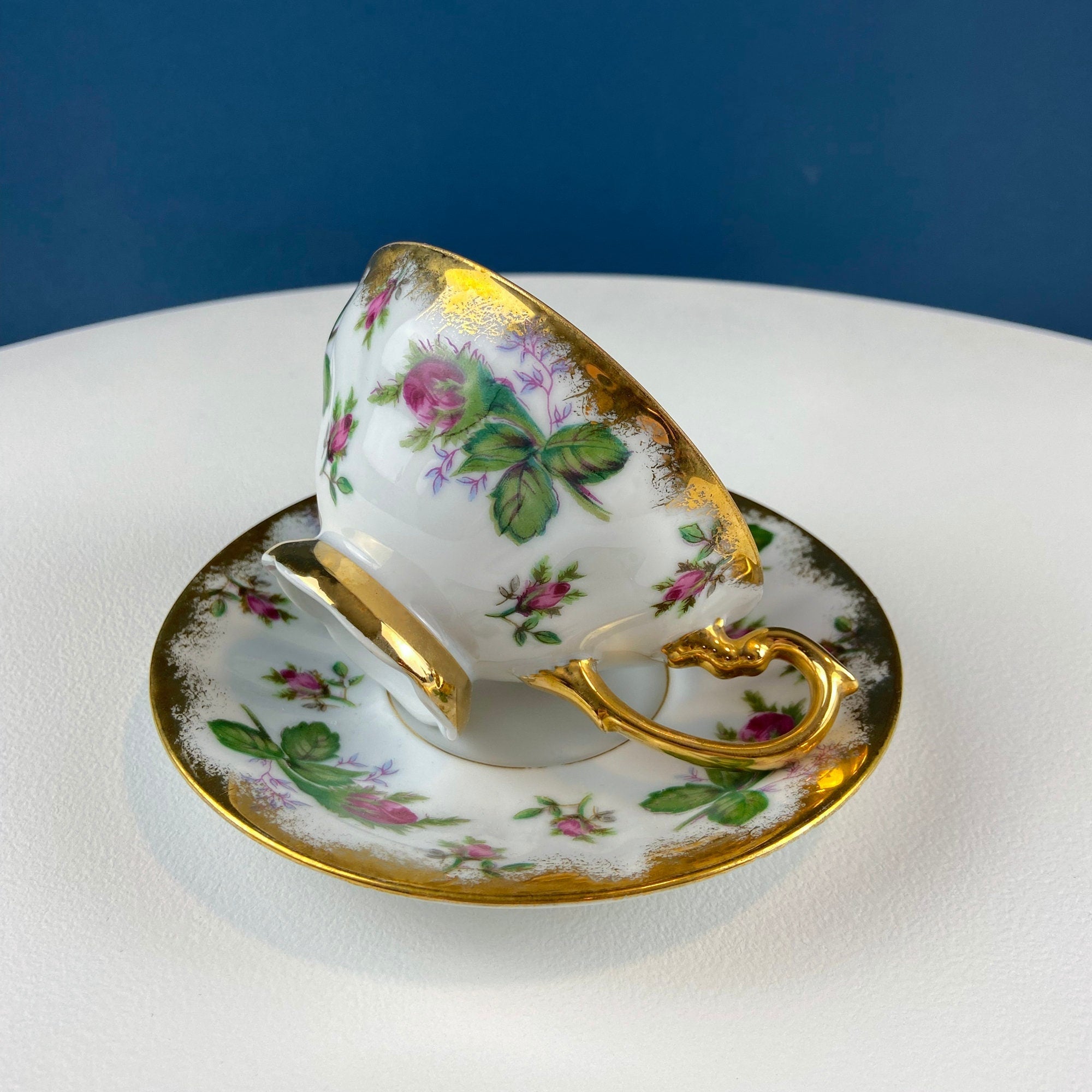 Vintage Moss Rose Porcelain Tea Cup and Saucer: Gold Swirl Silhouette