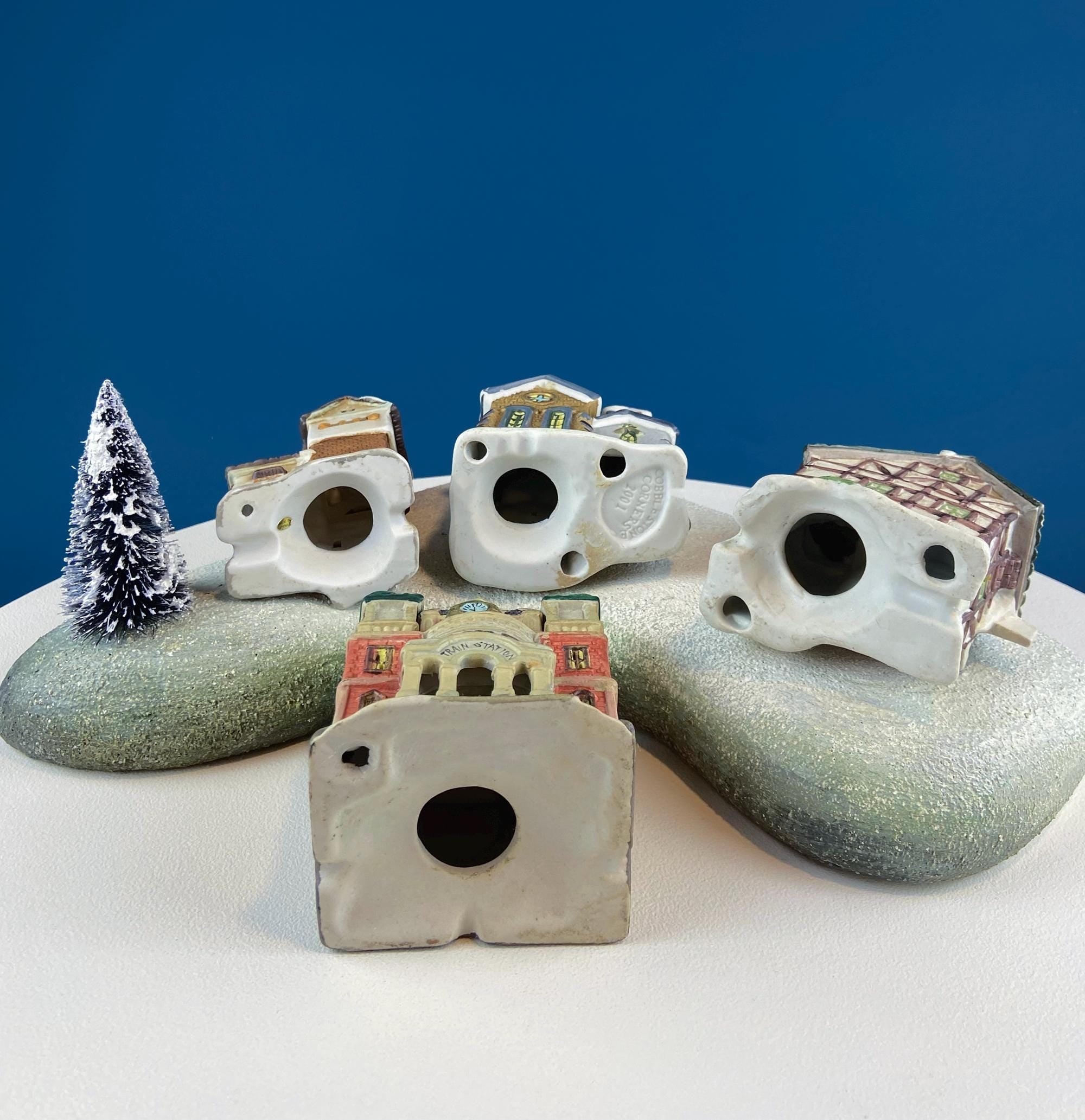 Christmas Village Collection of Small Illuminated Houses. Set of 4 Bldgs: Mill, 2 Churches, Train St., Council Offices, 2 Sheep and 3 Pines.